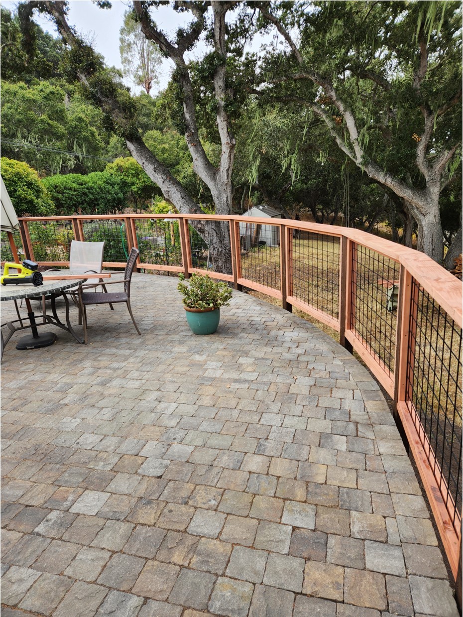 Fence Contractor Monterey exterior wooden fence with metal interior