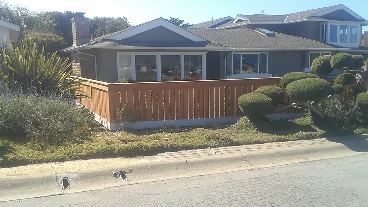 Fence Contractor Monterey exterior wooden fence in frontyard